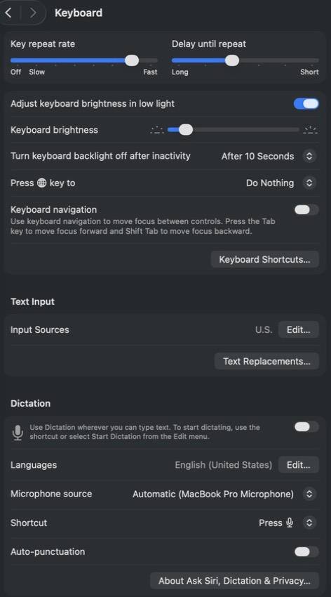 Actual macOS Keyboard settings showing Press Globe key to set to Do Nothing and Apple Dictation switched off.